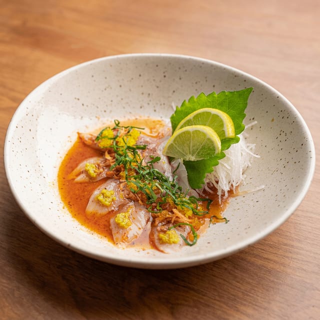 Loup De Mer Carpaccio*.